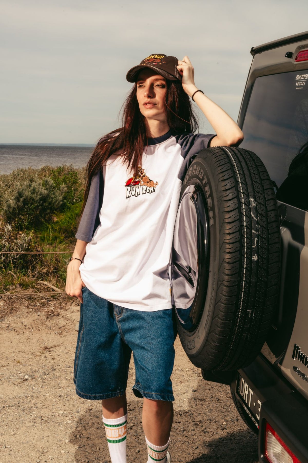 Model in the Scooby-Doo Ruh Roh raglan tee and brown Scooby-Doo cap